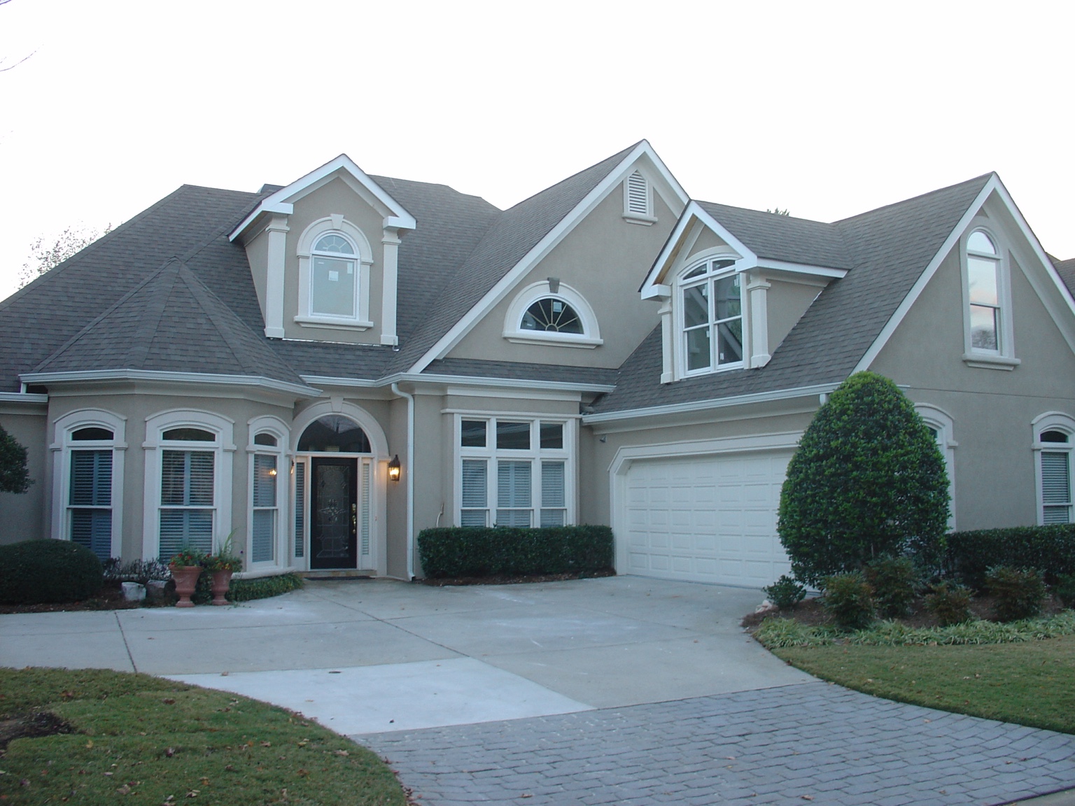 Completed residence with new dormers above the garage