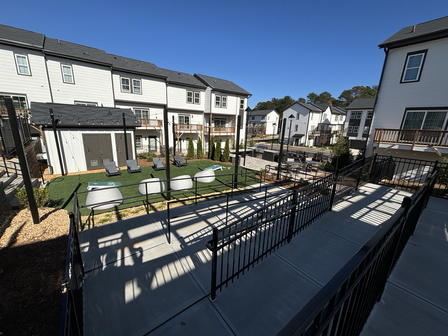 Outdoor recreation and entertaining spaces beside the clubhouse